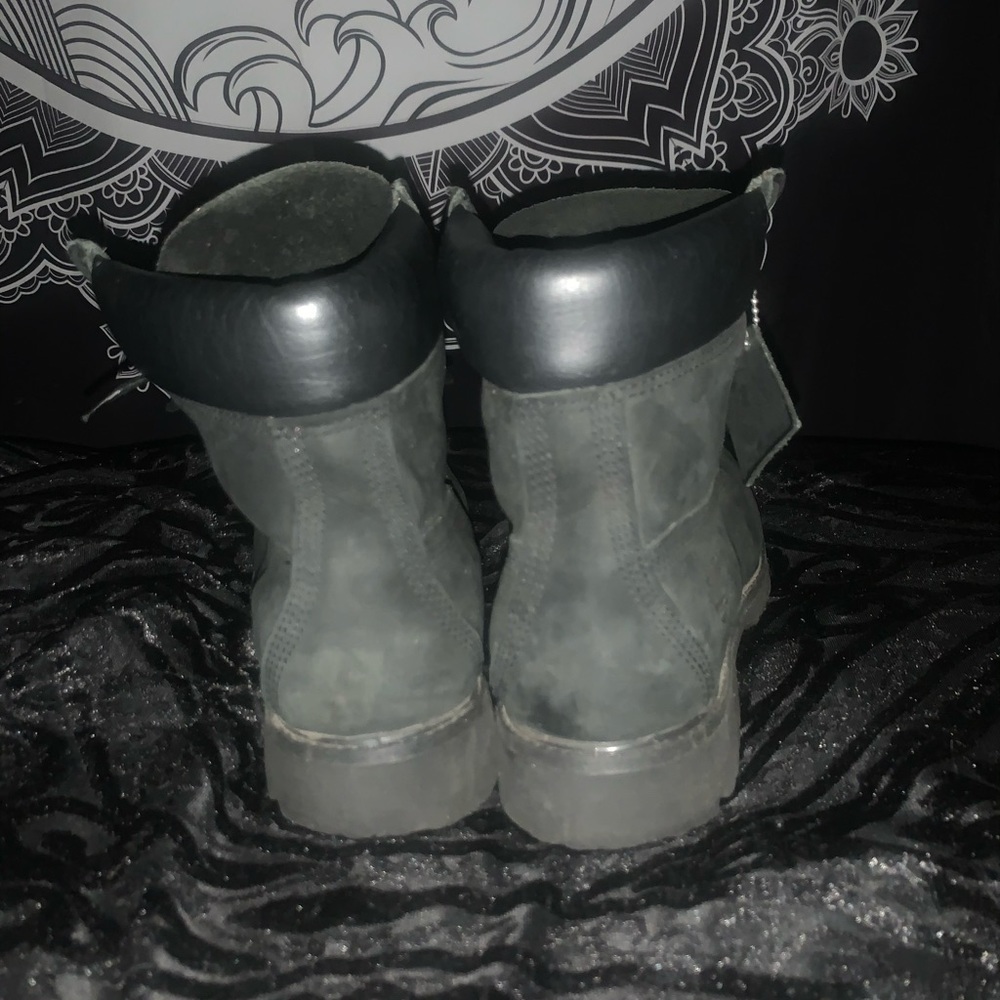 slightly worn black timberland boots